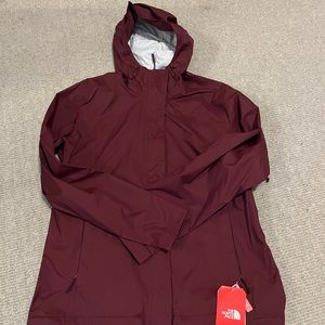red north face rain jacket